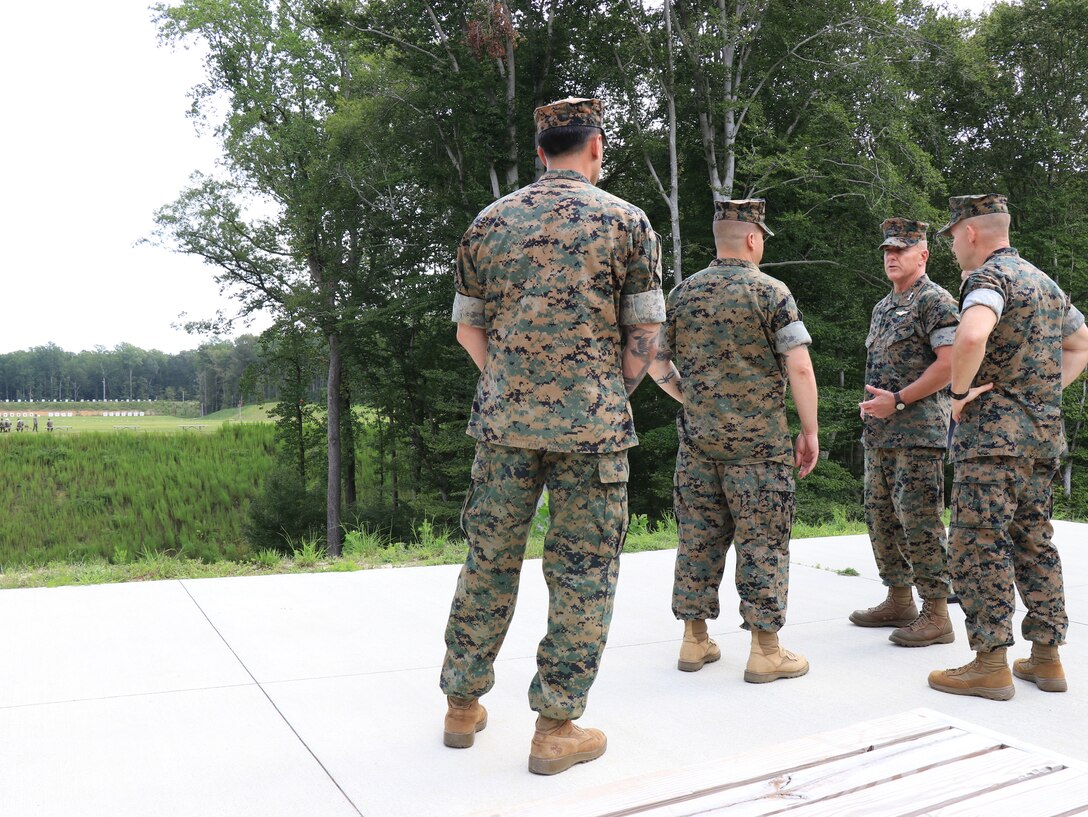 U.S. Marine Corps Gen. Robert F. Hedelund, the U.S. Marine Corps Forces Command commanding general, speaks to range personnel during a visit to Marine Corps Security Force Regiment (MCSFR) at Naval Weapons Station Yorktown, Virginia, Aug. 27, 2019. The leaders spoke about MCSFR’s mission and capabilities as the largest Marine Corps regiment with 11 subordinate units in 8 locations throughout the world to include Bahrain, Cuba, Japan, and Spain. (U.S. Marine Corps photo by Sgt. Jessika Braden/ Released)