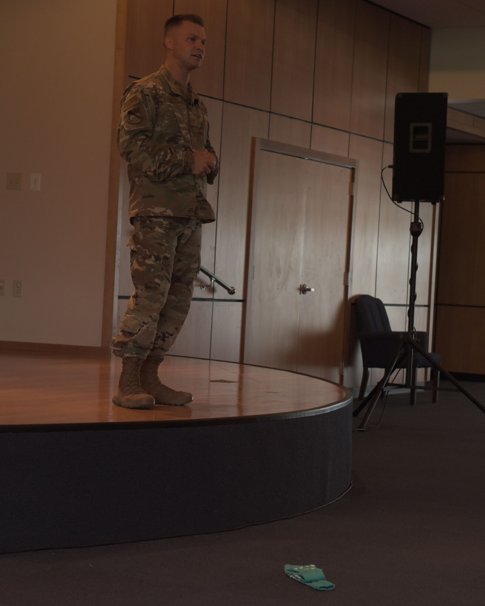 Tech. Sgt. Noah Stamps, 325th Fighter Wing Religious Affairs superintendent, speaks to an audience at a base wide all-call Aug. 27, 2019, at Tyndall Air Force Base, Fla. Stamps was a guest speaker at the event and told his story of dealing with reoccurring thoughts of suicide, anxiety and depression, and still being an able to serve. (U.S. Air Force photo by Senior Airman Dylan Auger)