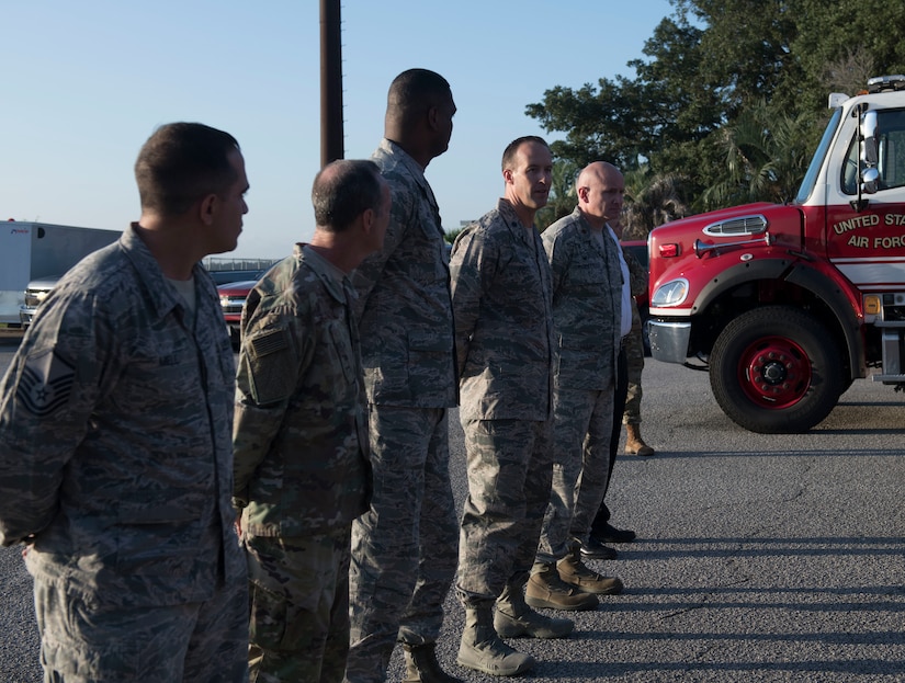 Lt. Col. Wayne Kinsel, 628th Civil Engineer Squadron commander, gives opening remarks during a push-in ceremony at Joint Base Charleston, S.C. Aug. 27, 2019. The push-in ceremony was a way for the Fire Department to welcome two new firetrucks to their fleet, a P-26 water tanker and a P-26 aerial apparatus, and was the first of its kind at JB Charleston. Push-in ceremonies date back to when firefighters responded with horses and carriages and pushed their carriages back into stalls after returning from a call.