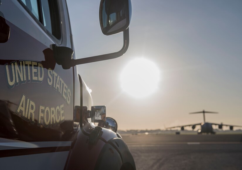 A firetruck is parked on the flightline during a push-in ceremony at Joint Base Charleston, S.C. Aug. 27, 2019. The push-in ceremony was a way for the Fire Department to welcome two new firetrucks to their fleet, a P-26 water tanker and a P-26 aerial apparatus, and was the first of its kind at JB Charleston. Push-in ceremonies date back to when firefighters responded with horses and carriages and pushed their carriages back into stalls after returning from a call.