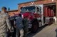 Members of the 628th Civil Engineer Squadron Fire Department push a firetruck during a push-in ceremony at Joint Base Charleston, S.C. Aug. 27, 2019. The push-in ceremony was a way for the Fire Department to welcome two new firetrucks to their fleet, a P-26 water tanker and a P-26 aerial apparatus, and was the first of its kind at JB Charleston. Push-in ceremonies date back to when firefighters responded with horses and carriages and pushed their carriages back into stalls after returning from a call.