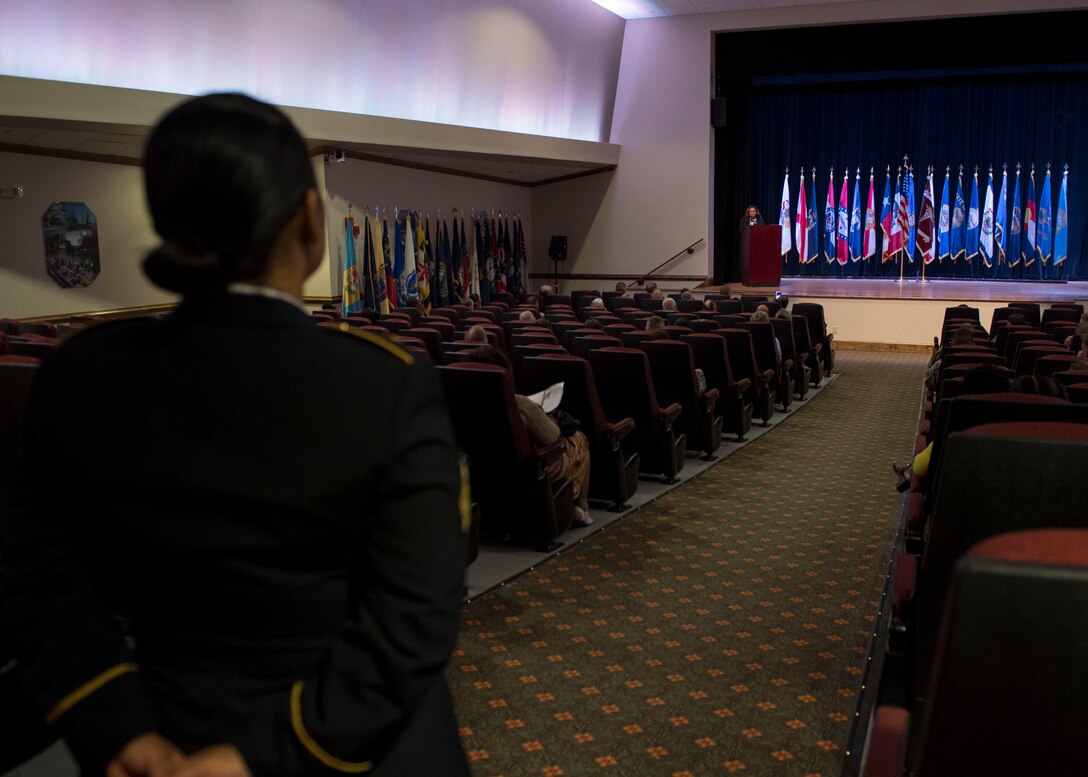 A U.S. Army Soldier listens to a speech during a Women’s Equality Day observance presentation at Joint Base Langley-Eustis, Virginia, Aug. 27, 2019.