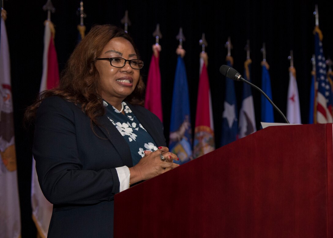 Retired U.S. Army Chief Warrant Officer Georgene Dixon gives a speech during a Women’s Equality Day observance presentation at Joint Base Langley-Eustis, Virginia, Aug. 27, 2019.