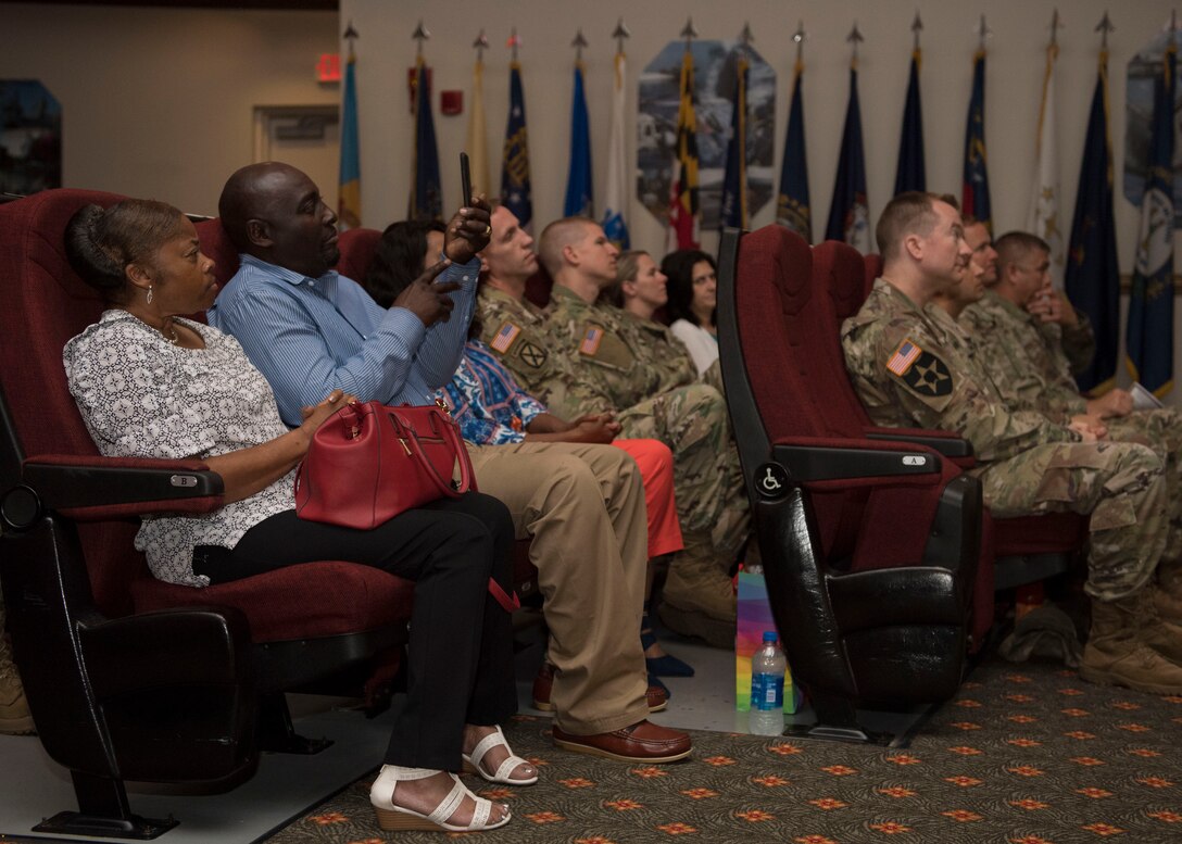 Audience members listen to a speech during a Women’s Equality Day observance presentation at Joint Base Langley-Eustis, Virginia, Aug. 27, 2019.