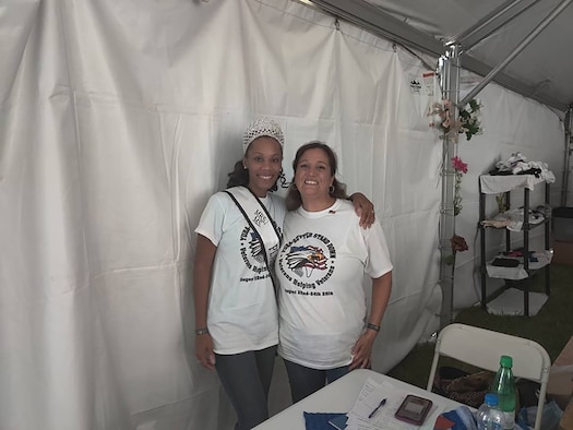 (Left to right) Staff Sgt. Breona Calvert, 50th Intelligence Squadron, commander’s support staff, poses with Shannon Gaytan, coordinator of the Women’s Tent and a veteran, as they prepare to service women in need during the Yuba Sutter 20th Year Stand Down event August 21-23 2019.