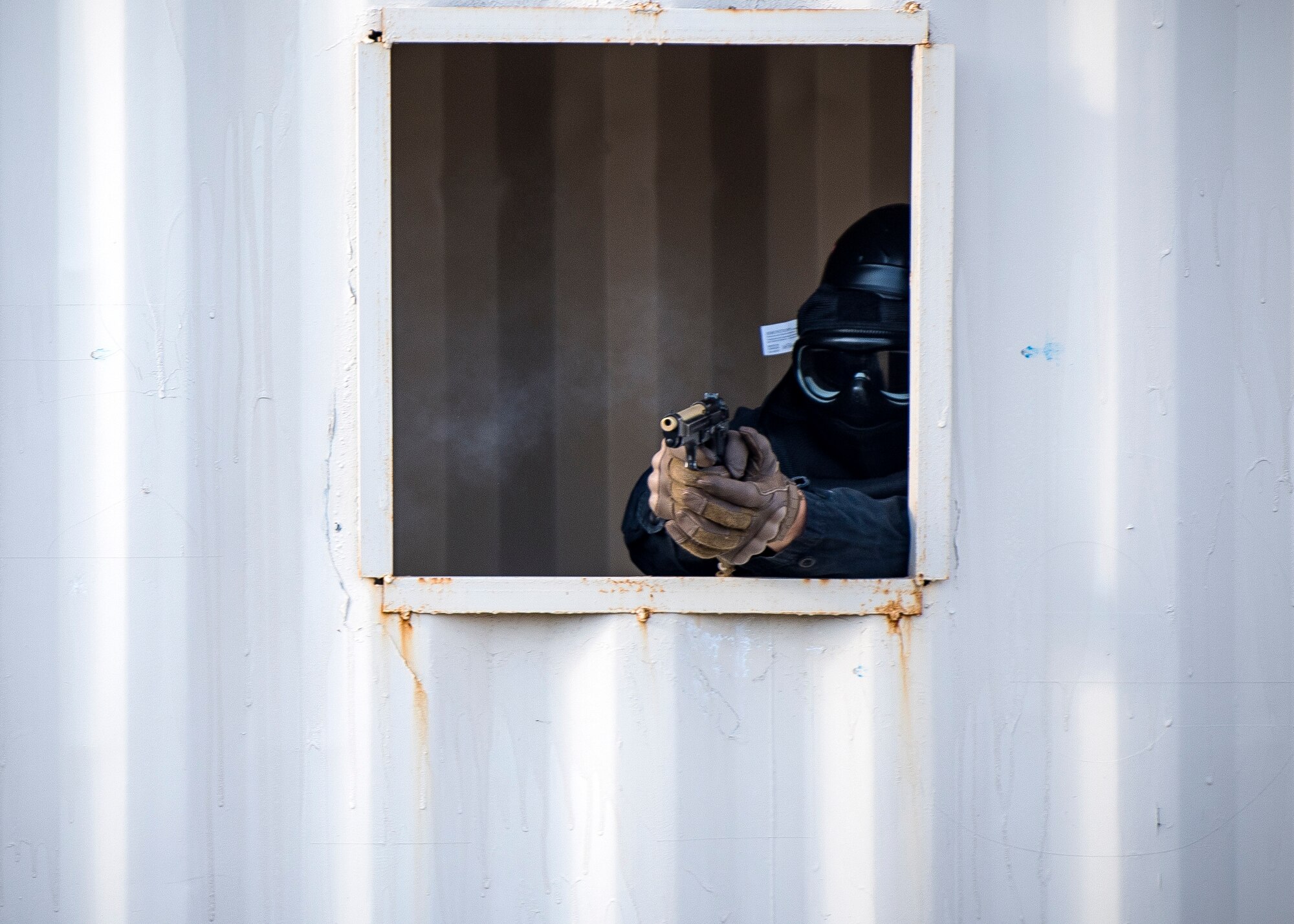 A Staff Weather Officer from the 3d Weather Squadron, fires an M9 pistol during a certification field exercise (CFX), July 29, 2019, at Camp Bowie Training Center, Texas. The CFX was designed to evaluate the squadron’s overall tactical ability and readiness to provide the U.S. Army with full spectrum environmental support to the Joint Task Force (JTF) fight. The CFX immersed Airmen into all the aspects of what could come with a deployment such as force on force scenarios. (U.S. Air Force photo by Airman 1st Class Eugene Oliver)