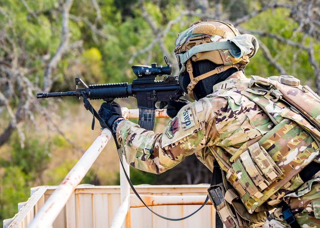 A Staff Weather Officer from the 3d Weather Squadron, fires an M4 Carbine during a certification field exercise (CFX), July 29, 2019, at Camp Bowie Training Center, Texas. The CFX was designed to evaluate the squadron’s overall tactical ability and readiness to provide the U.S. Army with full spectrum environmental support to the Joint Task Force (JTF) fight. The CFX immersed Airmen into all the aspects of what could come with a deployment such as force on force scenarios. (U.S. Air Force photo by Airman 1st Class Eugene Oliver)