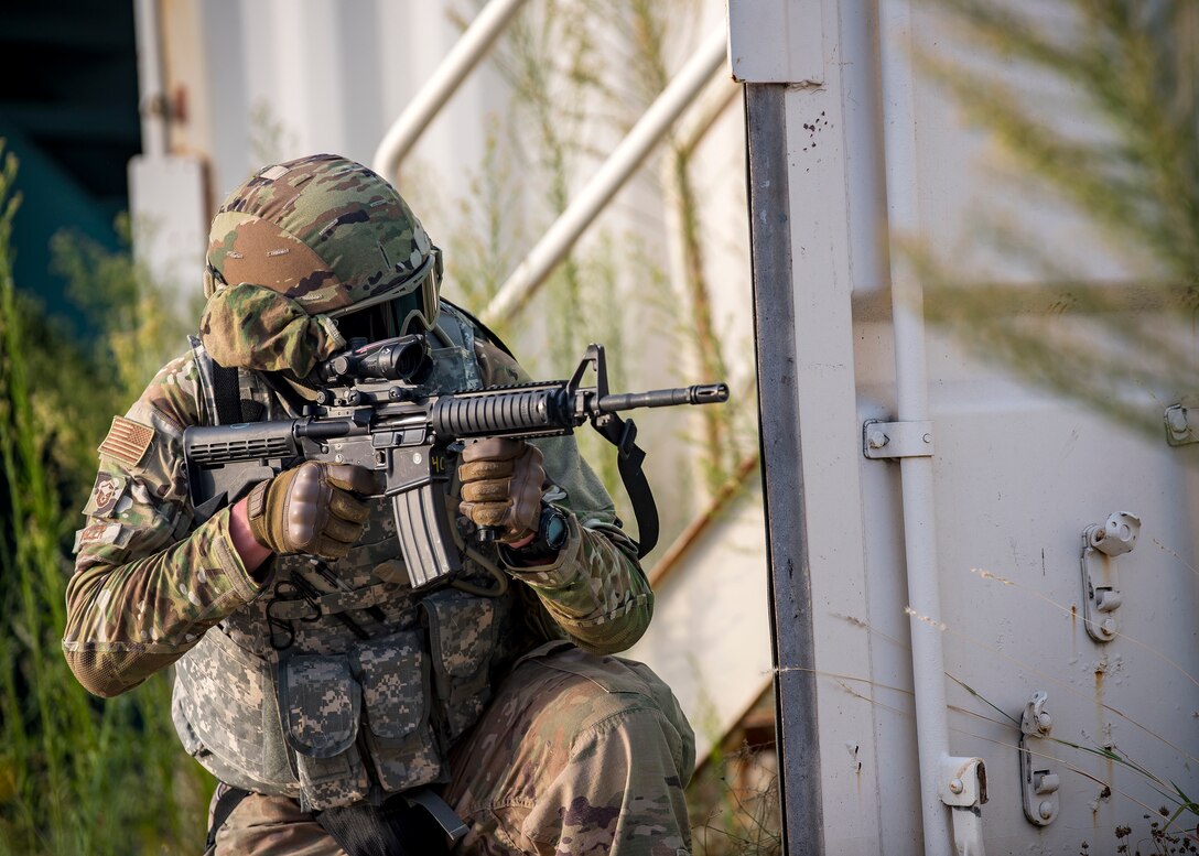 Master Sgt. Ryan Kegler, 3d Weather Squadron Det 1 section chief of division weather operations, fires an M4 Carbine during a certification field exercise (CFX), July 29, 2019, at Camp Bowie Training Center, Texas. The CFX was designed to evaluate the squadron’s overall tactical ability and readiness to provide the U.S. Army with full spectrum environmental support to the Joint Task Force (JTF) fight. The CFX immersed Airmen into all the aspects of what could come with a deployment such as force on force scenarios. (U.S. Air Force photo by Airman 1st Class Eugene Oliver)