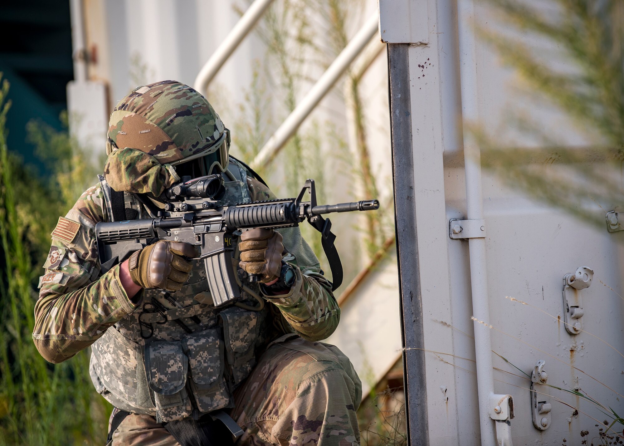 Master Sgt. Ryan Kegler, 3d Weather Squadron Det 1 section chief of division weather operations, fires an M4 Carbine during a certification field exercise (CFX), July 29, 2019, at Camp Bowie Training Center, Texas. The CFX was designed to evaluate the squadron’s overall tactical ability and readiness to provide the U.S. Army with full spectrum environmental support to the Joint Task Force (JTF) fight. The CFX immersed Airmen into all the aspects of what could come with a deployment such as force on force scenarios. (U.S. Air Force photo by Airman 1st Class Eugene Oliver)