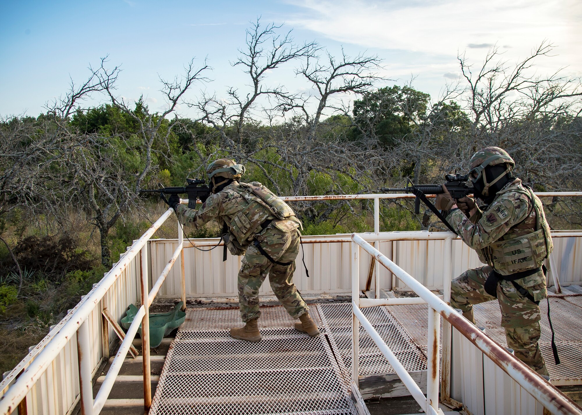 Staff Weather Officers from the 3d Weather Squadron, defend their position during a certification field exercise (CFX), July 29, 2019, at Camp Bowie Training Center, Texas. The CFX was designed to evaluate the squadron’s overall tactical ability and readiness to provide the U.S. Army with full spectrum environmental support to the Joint Task Force (JTF) fight. The CFX immersed Airmen into all the aspects of what could come with a deployment such as force on force scenarios. (U.S. Air Force photo by Airman 1st Class Eugene Oliver)