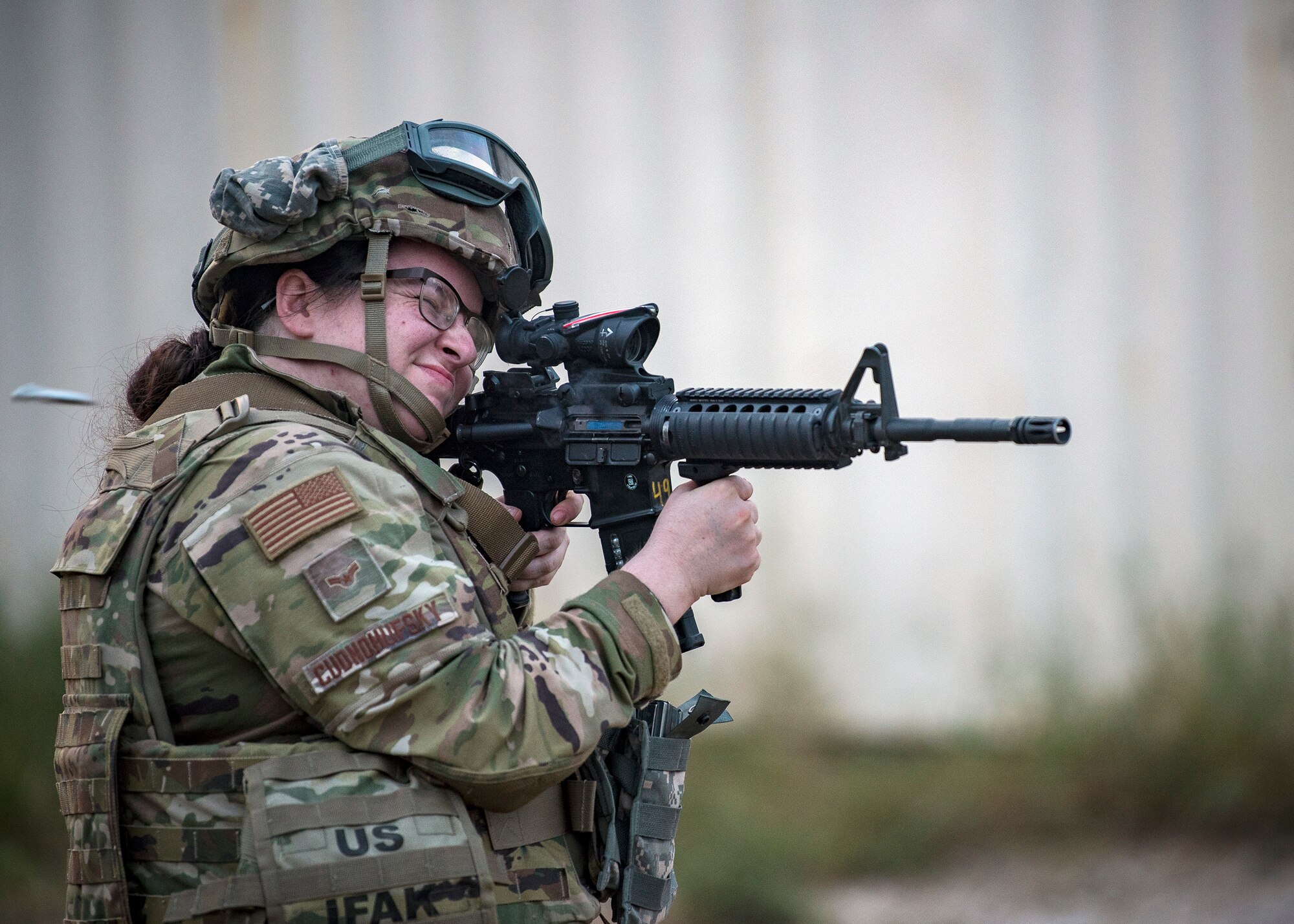 Airman 1st Class Elizabeth Cudnohufsky, 3d Weather Squadron weather forecaster fires an M4 carbine during a certification field exercise (CFX), July 30, 2019, at Camp Bowie Training Center, Texas. The CFX was designed to evaluate the squadron’s overall tactical ability and readiness to provide the U.S. Army with full spectrum environmental support to the Joint Task Force (JTF) fight. The CFX immersed Airmen into all the aspects of what could come with a deployment such as force on force scenarios. (U.S. Air Force photo by Airman 1st Class Eugene Oliver)