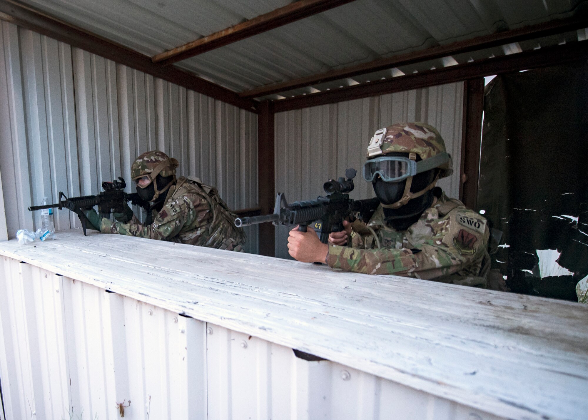 Staff Weather Officers from the 3d Weather Squadron, defend their position during a certification field exercise (CFX), July 30, 2019, at Camp Bowie Training Center, Texas. The CFX was designed to evaluate the squadron’s overall tactical ability and readiness to provide the U.S. Army with full spectrum environmental support to the Joint Task Force (JTF) fight. The CFX immersed Airmen into all the aspects of what could come with a deployment such as force on force scenarios. (U.S. Air Force photo by Airman 1st Class Eugene Oliver)