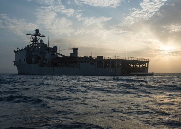 The stern gate opens to the well deck of the amphibious dock landing ship USS Harpers Ferry for amphibious operations. Harpers Ferry is part of the Boxer Amphibious Ready Group and 11th Marine Expeditionary Unit and is deployed to the U.S. 5th Fleet area of operations in support of naval operations to ensure maritime stability and security in the Central Region, connecting the Mediterranean and the Pacific through the Western Indian Ocean and three strategic choke points.