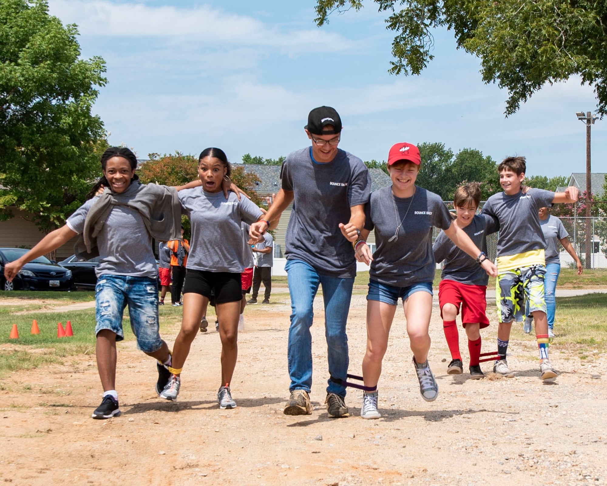 Team Shaw children participate in a three-legged race during a week-long resiliency camp at Shaw Air Force Base, South Carolina, Aug. 2, 2019.
