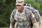 Army Staff Sgt. Earnest J. Knight II, Drill Sergeant Academy, on a ruck march.