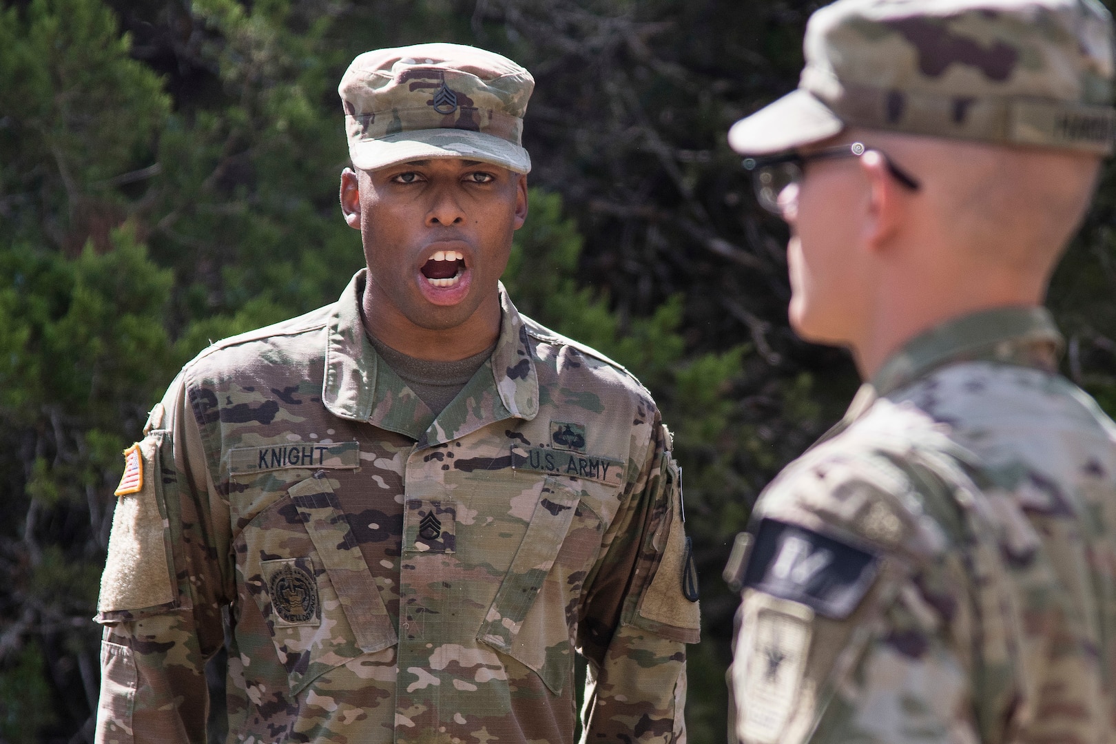 U.S. Army Staff Sgt. Earnest Knight II, U.S. Army Drill Sergeant Academy drill instructor, gives a soldier commands on the situational training exercise lanes during the Drill Sergeant of the Year Competition August 19, 2019, at Joint Base San Antonio-Camp Bullis.