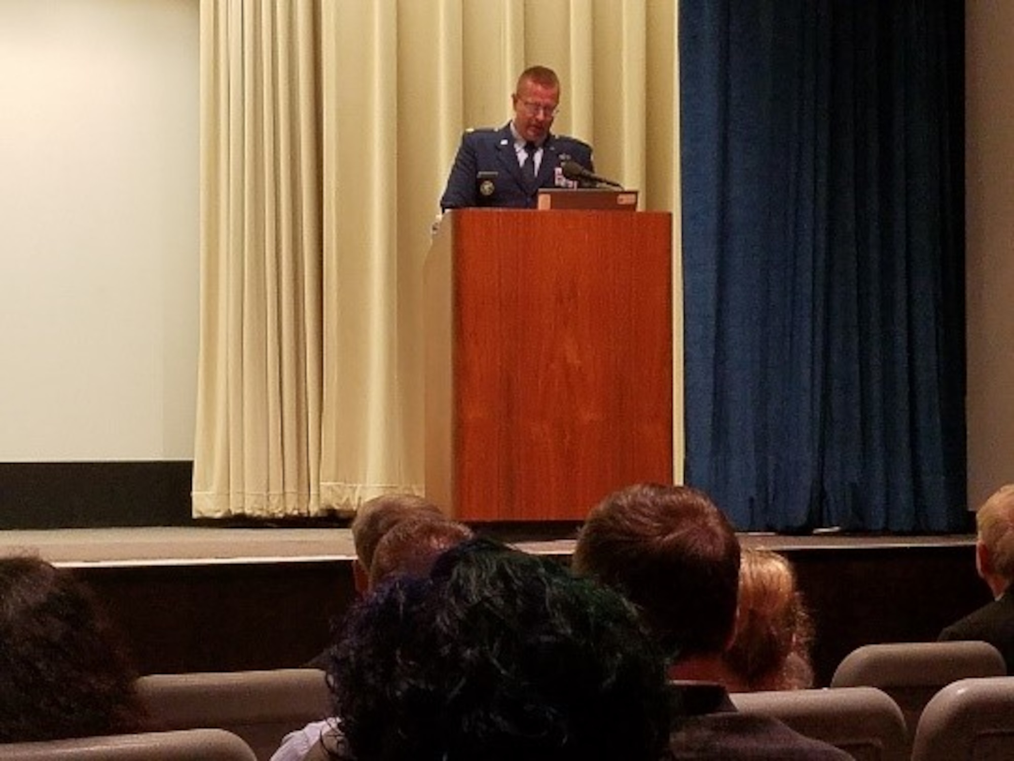 Maj. Thomas Wingard, F-135 Supply Chain Manager for the Defense Contract Management Agency, and former member of the 603rd ACS Scorpions, gives opening comments and background about their members who are being memorialized. (U.S. Air Force photo/Kimberly Gaither)