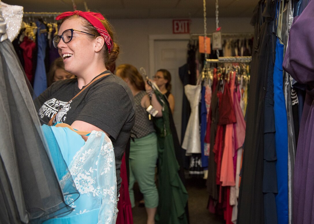 Customers shop for dresses during Operation Deploy Your Dress’ seasonal grand-opening at Joint Base Langley-Eustis, Virginia, Aug. 27, 2019.