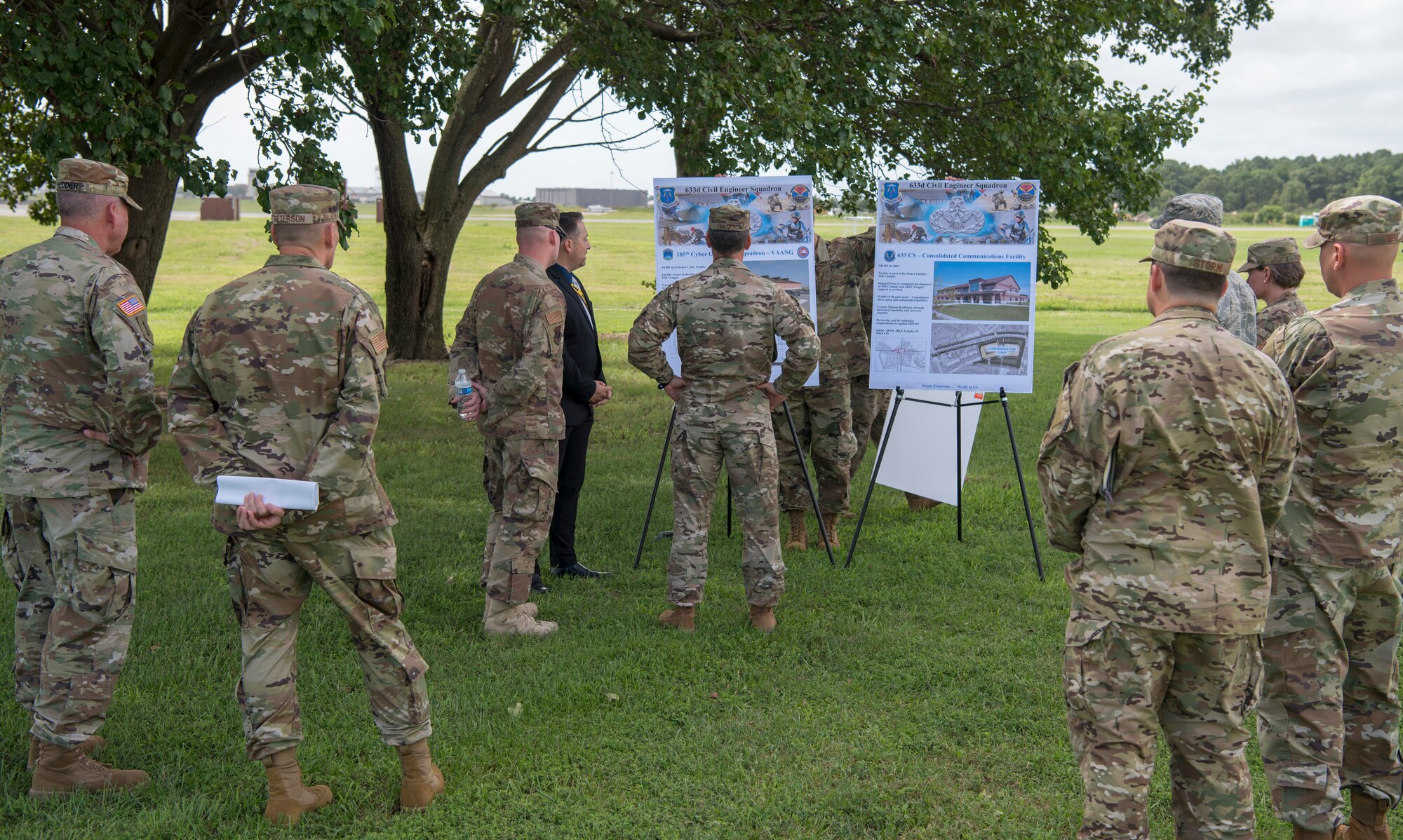 Mr. Travis Willer, 633rd Civil Engineer Squadron base community planner, briefs U.S. Air Force Maj. Gen. Chad Franks, Ninth Air Force commander, on future base improvements during a visit at Joint Base Langley-Eustis, Virginia, August 26, 2019.