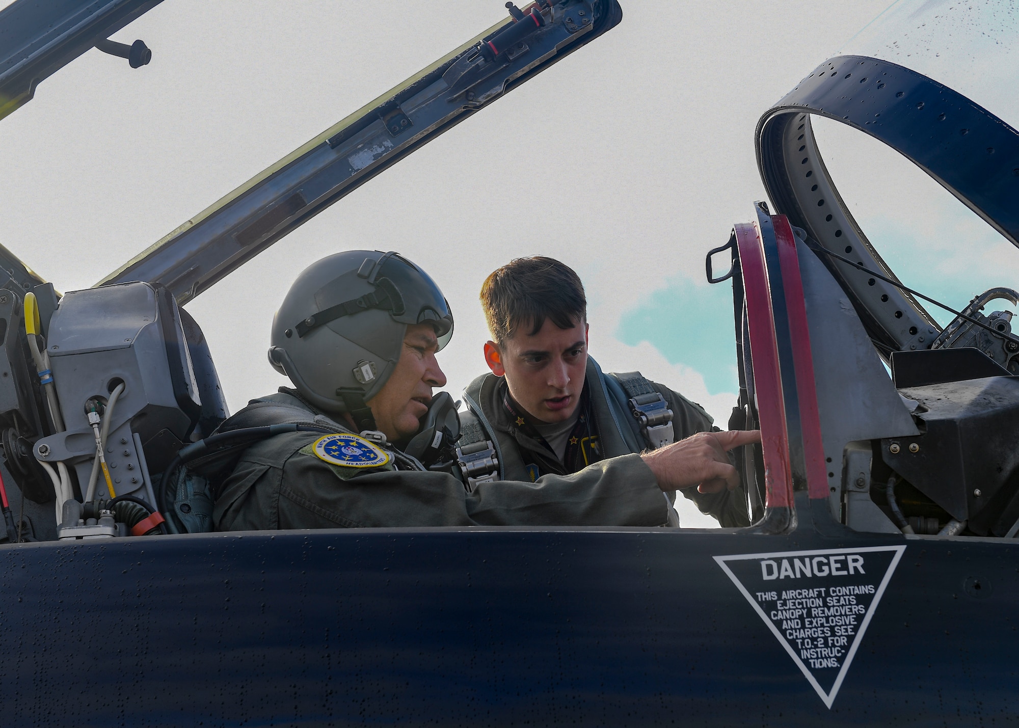 U.S. Air Force Maj. Gen. Chad Franks, Ninth Air Force commander, performs a pre-flight check with 1st Lt Michael Koon, 1st Fighter Wing flight safety officer prior to a T-38 Talon aircraft takeoff, August 28, 2019 at Joint Base Langley-Eustis, Virginia.