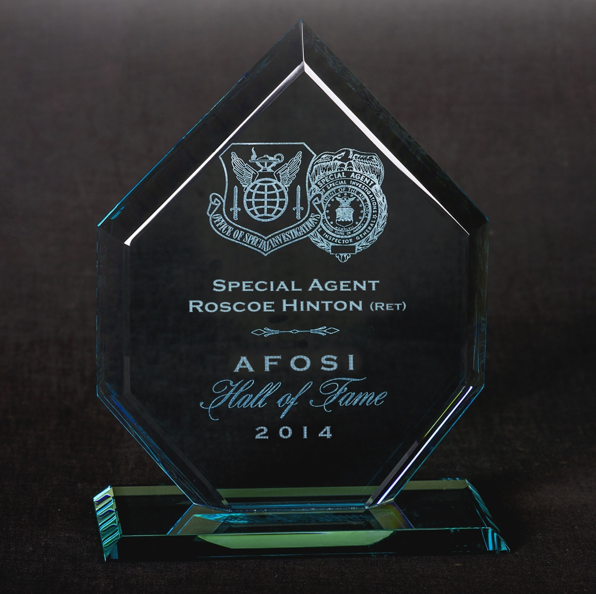 Each inductee into the Air Force Office of Special Investigations Hall of Fame receives an award like this one belonging to 2014 Hall of Fame Inductee Special Agent (Retired) Roscoe Hinton. (AFOSI photo by Michael Hastings)