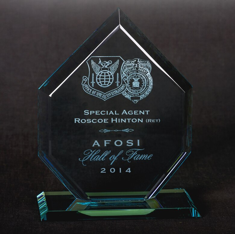 Each inductee into the Air Force Office of Special Investigations Hall of Fame receives an award like this one belonging to 2014 Hall of Fame Inductee Special Agent (Retired) Roscoe Hinton. (AFOSI photo by Michael Hastings)