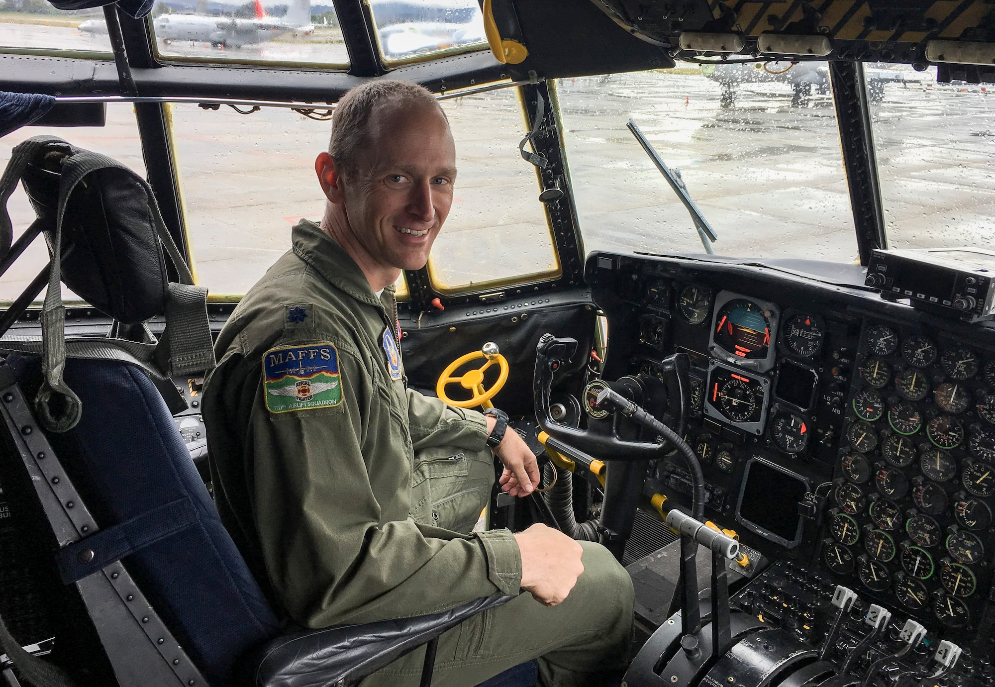 Lt. Col. Richard Pantusa, 731st Airlift Squadron director of operations, poses for a photo in the cockpit of a C-130 Hercules at Peterson Air Force Base, Colo. (Courtesy photo)