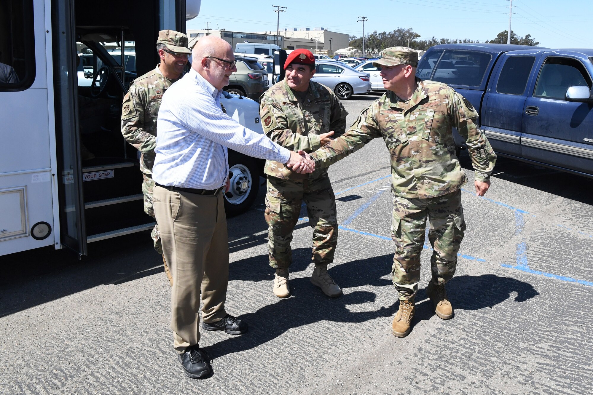 John Roth, performing the duties of the Under Secretary of the Air Force (left), is greeted by Col. Scott Brodeur, Combined Space Operations Center (CSpOC) director (right), and Brig. Gen. Matthew Davidson, 14th Air Force vice commander (center), during a visit at Vandenberg AFB, Calif., Aug. 27, 2019