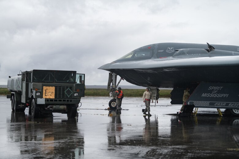 509th Logistics Readiness Squadron fuel distribution operators from Whiteman Air Force Base, Missouri, conduct a hot-pit refueling on a B-2 Spirit Bomber at Keflavik Air Base, Iceland, Aug. 28, 2019. Hot-pit refueling is a method of refueling an aircraft without shutting down the engines. This is the B-2s first time landing in Iceland. Forward locations like Iceland enhance the collective defense capabilities of both the U.S. and NATO allies partners. (U.S. Air Force photo by Senior Airman Thomas Barley)
