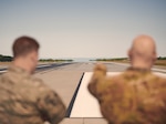 U.S. Air Force Staff Sgt. Joseph Mailloux and Master Sgt. Darren Adams, both assigned to the airfield management section of the 158th Operations Group, 158th Fighter Wing, Vermont Air National Guard, inspect the flightline to ensure it meets all applicable requirements at the Burlington Air National Guard Base, Vt., Aug. 3, 2019. Inspections are done on the flightline daily as a prerequisite to flying, and are done alongside preparations ramping up ahead of F-35 Lightning IIs arriving at a future date. (U.S. Air National Guard photo by Tech. Sgt. Ryan Campbell)