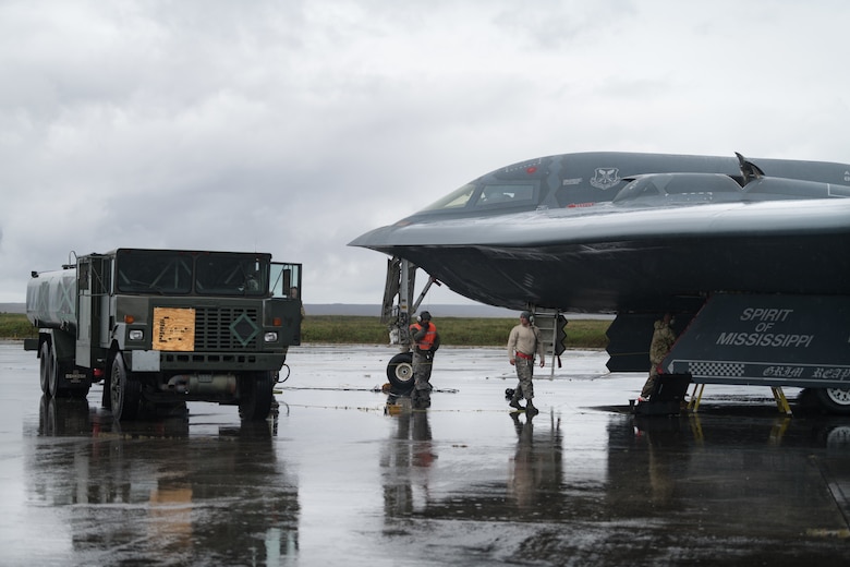 509th Logistics Readiness Squadron fuel distribution operators from Whiteman Air Force Base, Missouri conduct a hot-pit refueling on a B-2 Spirit Bomber at Naval Air Station Keflavik, Iceland, August 28, 2019. Hot-pit refueling is a method of refueling an aircraft without shutting down the engines. This is the B-2s first time landing in Iceland. Forward locations like Iceland enhance the collective defense capabilities of both the U.S. and NATO allies partners. (U.S. Air Force photo by Senior Airman Thomas Barley)