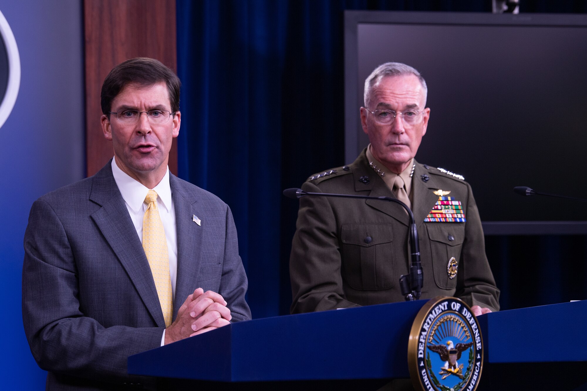 U.S. Secretary of Defense Mark T. Esper speaks to members of the press during his first joint press conference with Marine Corps Gen. Joe Dunford, chairman of the Joint Chiefs of Staff, at the Pentagon Briefing Room, on Aug. 28, 2019.