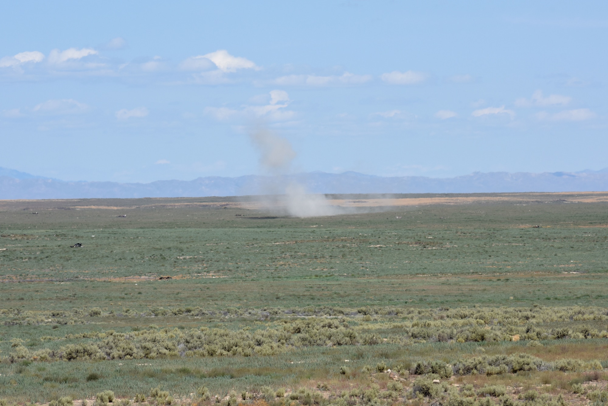 A mortar round fired by the 56th Stryker Brigade, Pennsylvania Army National Guard, hits its target.