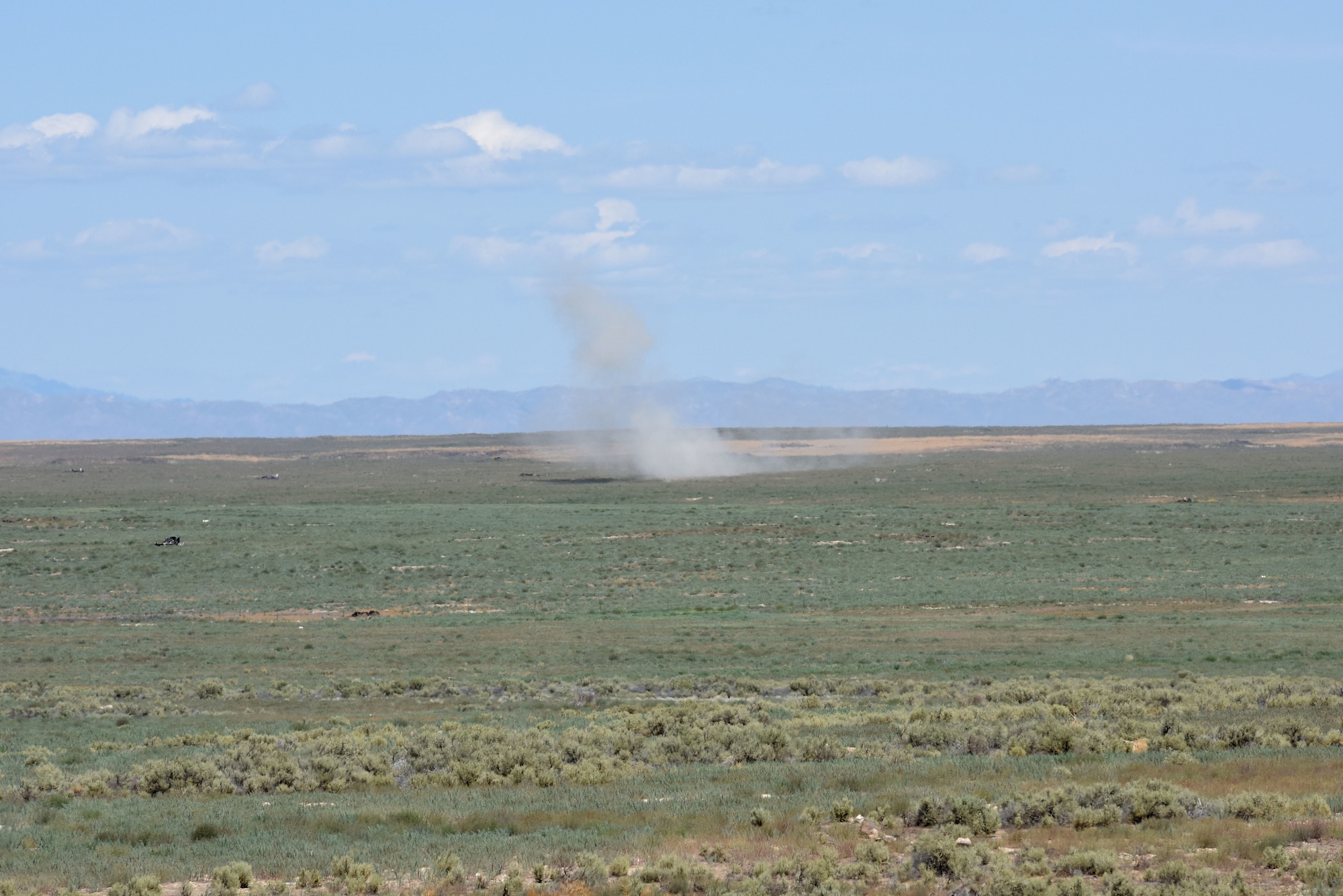 A mortar round fired by the 56th Stryker Brigade, Pennsylvania Army National Guard, hits its target.