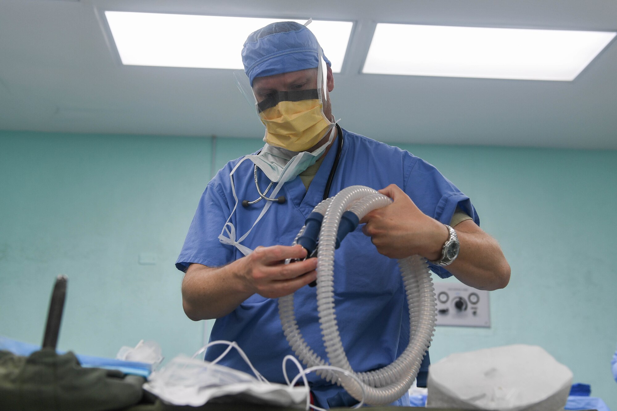 Col. Greg Malone, an anesthesiologist assigned to the 88th Medical Group from Wright Patterson Air Force Base, prepares medical equipment for a hysterectomy surgery during New Horizons exercise 2019 at the Linden MacKenzie Hospital in Linden, Guyana. U.S. military members provided women’s health surgical services to reduce a backlog of patients awaiting care due to Guyana’s limited medical resources. (U.S. Air Force photo/Senior Airman Derek Seifert)