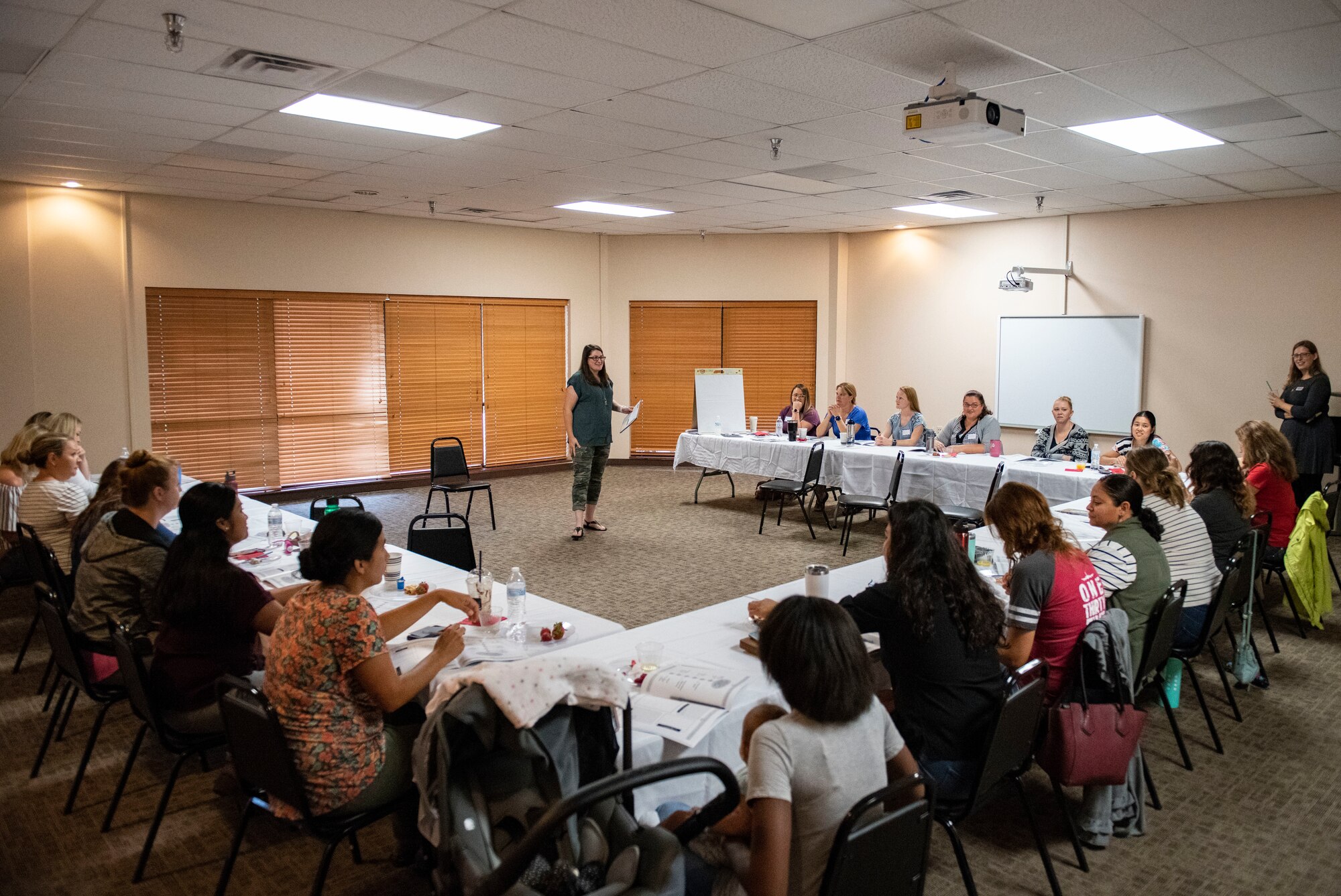 Spouse of the years conducts workshop with militry spouses.
