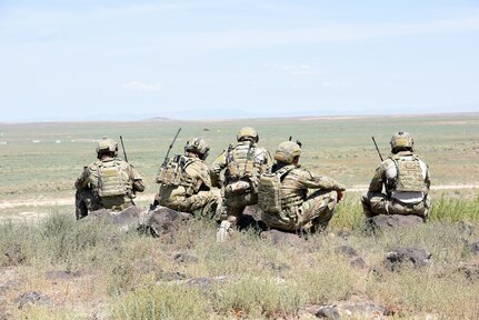 Tactical Air Control Party Specialists with the 148th Air Support Operations Squadron wait for the A-10 air support they called in to drop simulated munitions on a target Aug. 13, 2019. The Pennsylvania Air National Guardsmen traveled to Orchard Combat Training Center near Boise this summer to practice their ground combat skills, working alongside their Army counterparts at the 56th Stryker Brigade, Pennsylvania Army National Guard, and the Idaho Air National Guard.