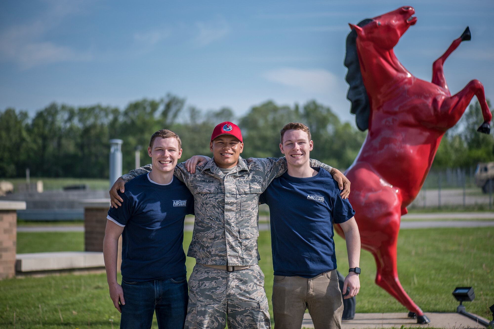 Brothers Tyler Jenkins, SrA Anthony Thielman and Dylan Jenkins, all members of the 200th REDHORSE Squadron, pose for a photograph May 19, 2019, at the 200th REDHORSE Squadron, Mansfield, Ohio. Dylan and Tyler recently enlisted into the Ohio Air Guard, following in the footsteps of their older brother. (U.S. Air National Guard photo by Airman 1st Class Alexis Wade)