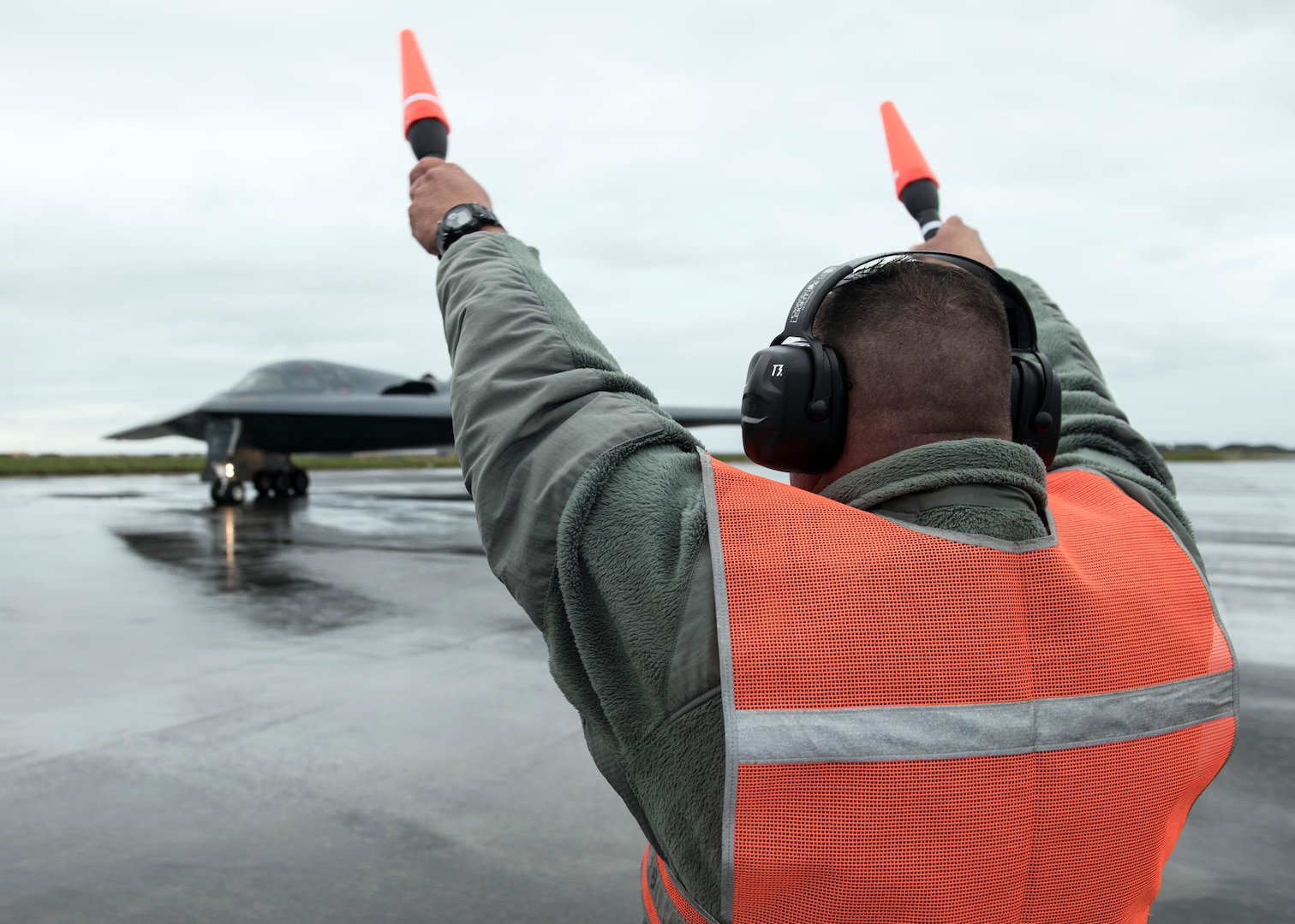 Master Sgt. Scott Smith, a hydraulics shop chief assigned to the 131st Maintenance Squadron Group, marshals a B-2 Spirit Stealth Bomber at Naval Air Station Keflavik, Iceland, August 28, 2019. This is the B-2s first time ever landing in Iceland. While in Iceland Airmen from Whiteman conducted hot-pit refueling, which is a method of refueling an aircraft without shutting down the engines. Training with partners, allied nations and other U.S. Air Force units contributes to our readiness and enables us to build enduring and strategic relationships necessary to confront a broad range of global challenges.