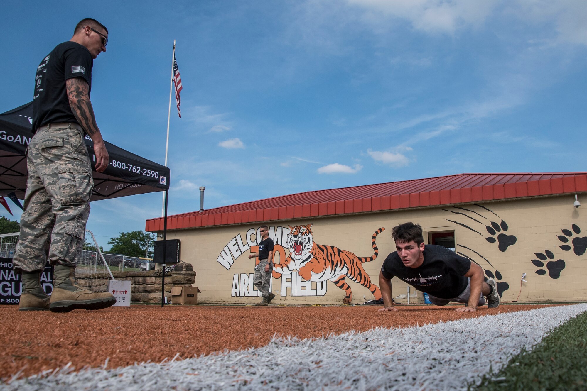 The Mansfield Senior High School Tygers and the Shelby High School Whippets football team participates in the 179th Airlift Wing's "Herc Challenge" held at Arlin Field, Mansfield, Ohio, June 19, 2019. The recruiting event is designed to motivate participants while making them aware of the benefits the Air National Guard can offer them right in their own back yard. (U.S. Air National Guard photo by Airman 1st Class Alexis Wade)