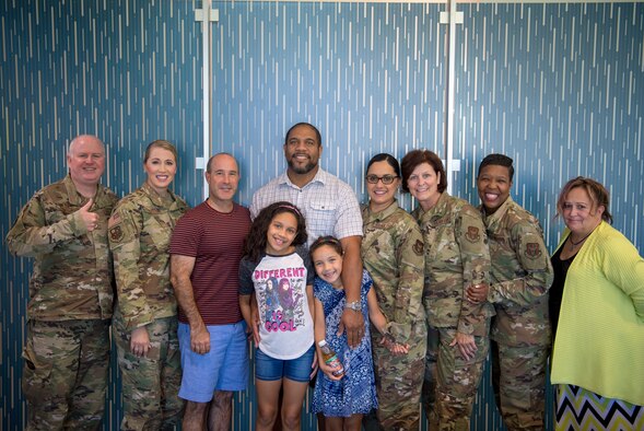 Col. Pemberton, 514th Air Mobility Wing Commander, joined by other members of the Freedom Wing and their family enjoying the new dining options of the recently reopened Halvorsen Hall.