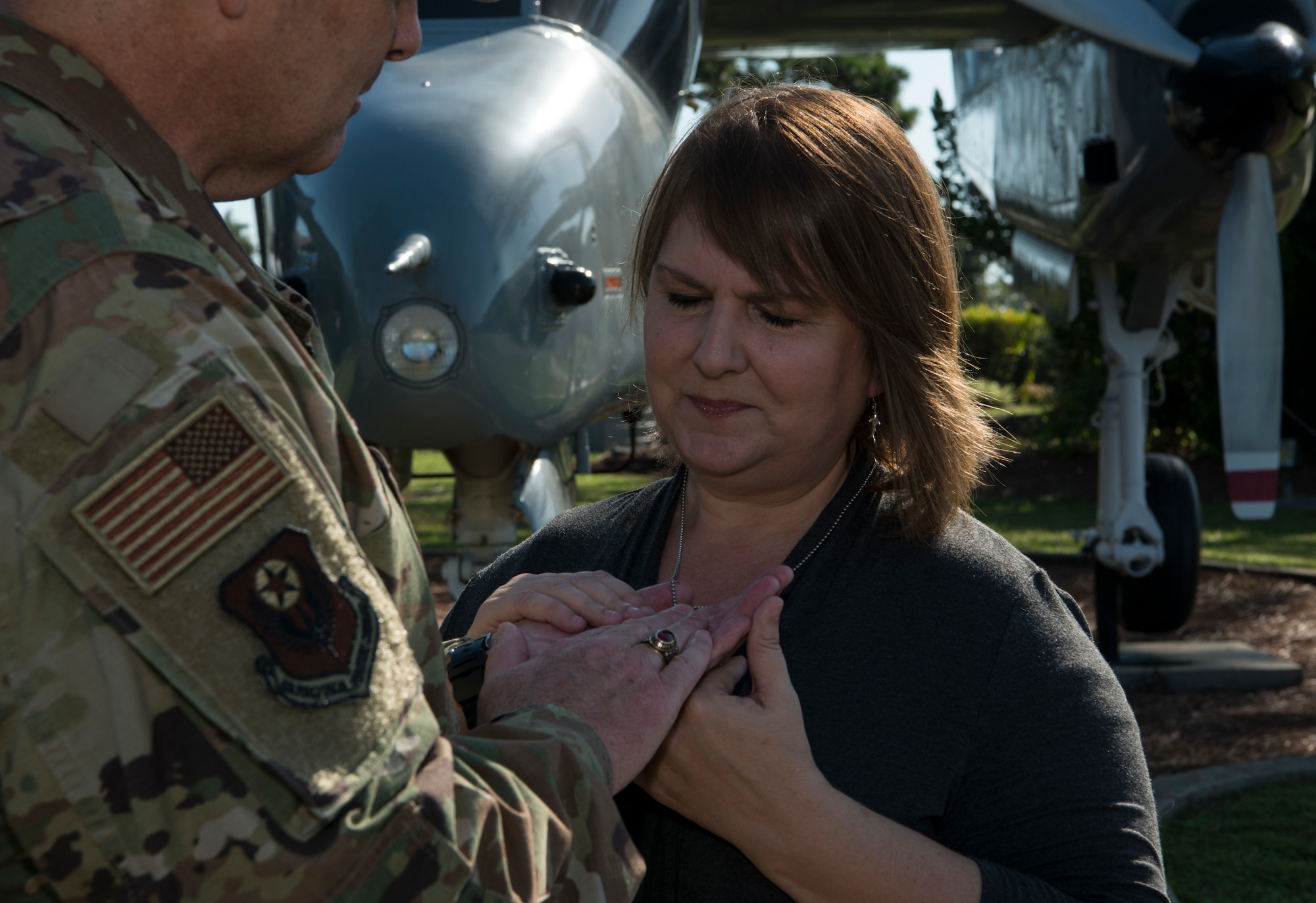 Two people standing together in an airpark.