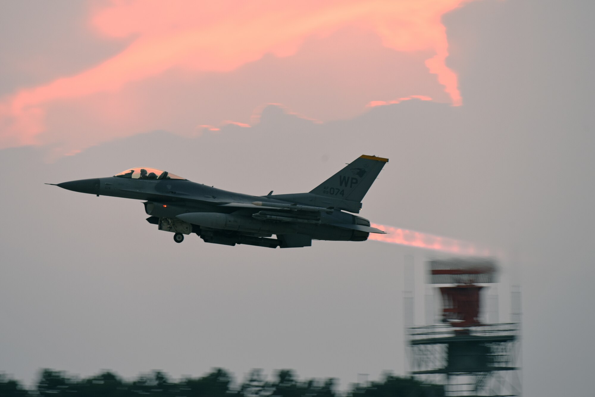 A U.S. Air Force pilot with the 35th Fighter Squadron takes off in an F-16 Fighting Falcon during routine training at Kunsan Air Base, Republic of Korea, Aug. 29, 2019. The 8th Fighter Wing regularly flies its F-16s for various training opportunities, to include flying alongside units from the Republic of Korea Air Force's 38th Fighter Group. (U.S. Air Force photo by Staff Sgt. Joshua Edwards)