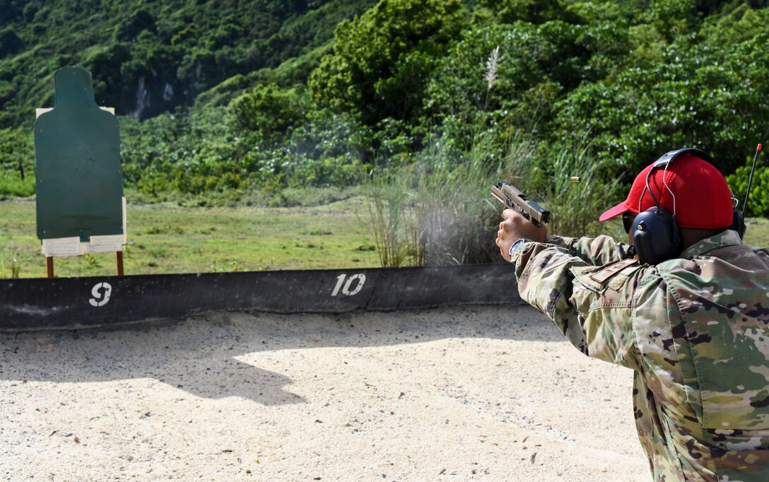 Tech Sgt. Kevin Tajalle, 36th Security Forces Squadron combat arms instructor, fires a Sig Sauer M18 pistol on Andersen Air Force Base, Guam, Aug. 27, 2019. The M18 replaces the M9 Beretta, the M11-A1 Compact used by the Air Force Office of Special Investigations and the U.S. Army M15 General Officer pistol used for military working dog training. (U.S. Air Force photo by Airman 1st Class Michael S. Murphy)