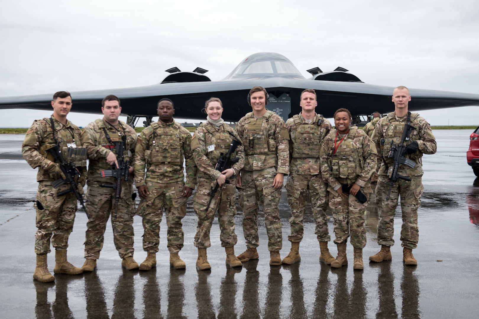 Security Forces Airmen from Whiteman Air Force Base, Missouri, pose in front of a B-2 Spirit Bomber at Naval Air Station Keflavik, Iceland, August 28, 2019, during a hot-pit refueling. Hot-pit refueling is a method of refueling an aircraft without shutting down the engines. This is the B-2s first time landing in Iceland. Forward locations like Iceland enhance the collective defense capabilities of both the U.S. and NATO allies.