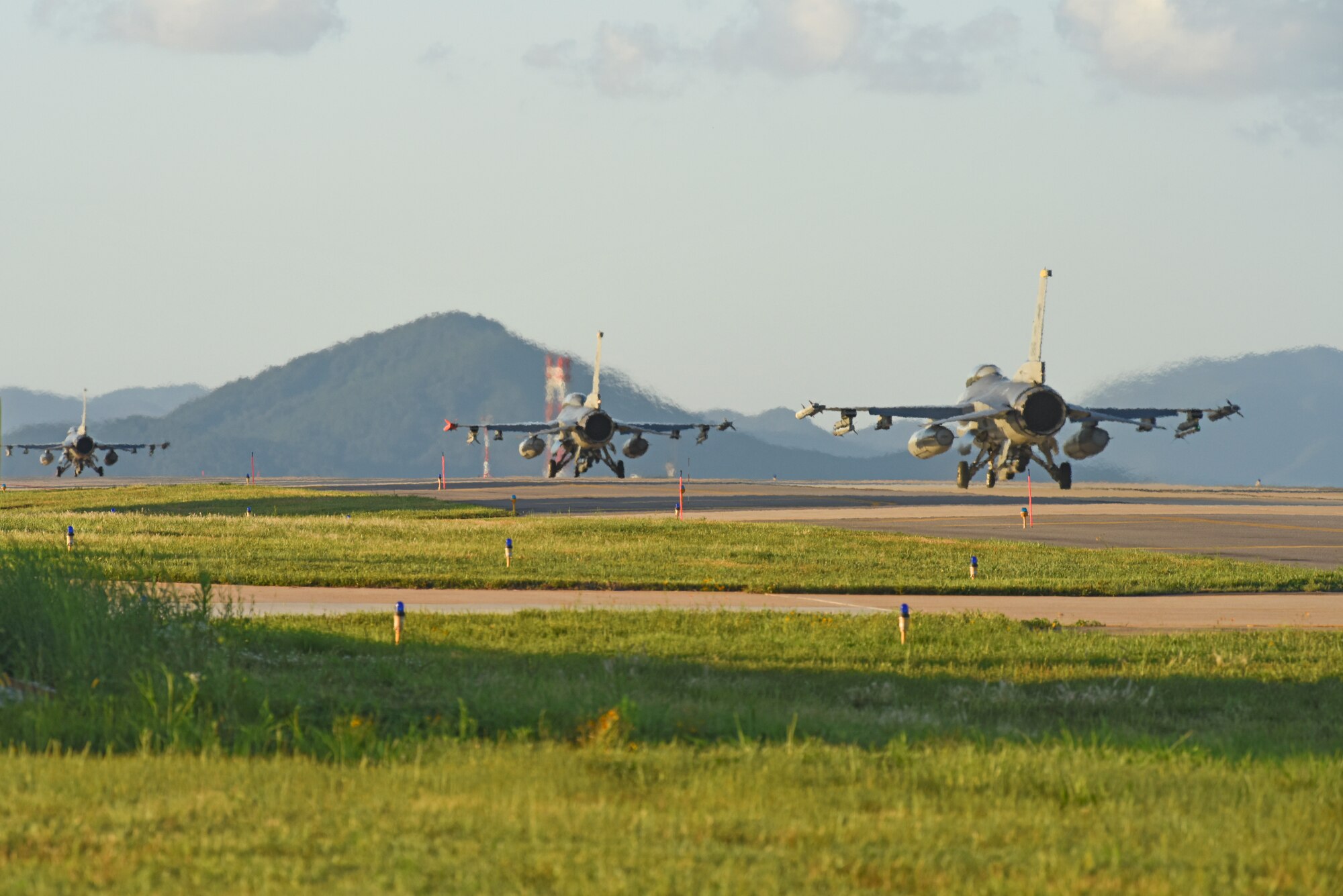 U.S. Air Force F-16 Fighting Falcons assigned to the 8th Fighter Wing taxi down the runway in preparation for a routine training flight at Kunsan Air Base, Republic of Korea, Aug. 30, 2019. The 8th FW is home to two fighter squadrons, the 80th Fighter Squadron “Juvats” and 35th FS “Pantons.” (U.S. Air Force photo by Staff Sgt. Mackenzie Mendez)