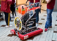 PHILADELPHIA (Aug. 29) Central High School’s RoboLancers FIRST Tech Challenge (FTC) Team shows off their robot during a robotics mentoring seminar at Naval Surface Warfare Center, Philadelphia Division (NSWCPD). NSWCPD is partnering with the Philadelphia Robotics Coalition to support more than 20 robotics teams during this school year. (U.S. Navy photo by Keegan Rammel)/Released