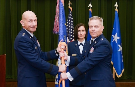 U.S. Air Force Maj. Gen. Timothy D. Haugh (right) takes command of Twenty-Fifth Air Force from Gen. Mike Holmes, Air Combat Command commander, during a change of command ceremony at Joint Base San Antonio-Lackland Aug. 29. Haugh succeeds Maj. Gen. Mary F. O’Brien, who was recently confirmed as the Air Force’s next deputy chief of staff for ISR and cyber effects operations.