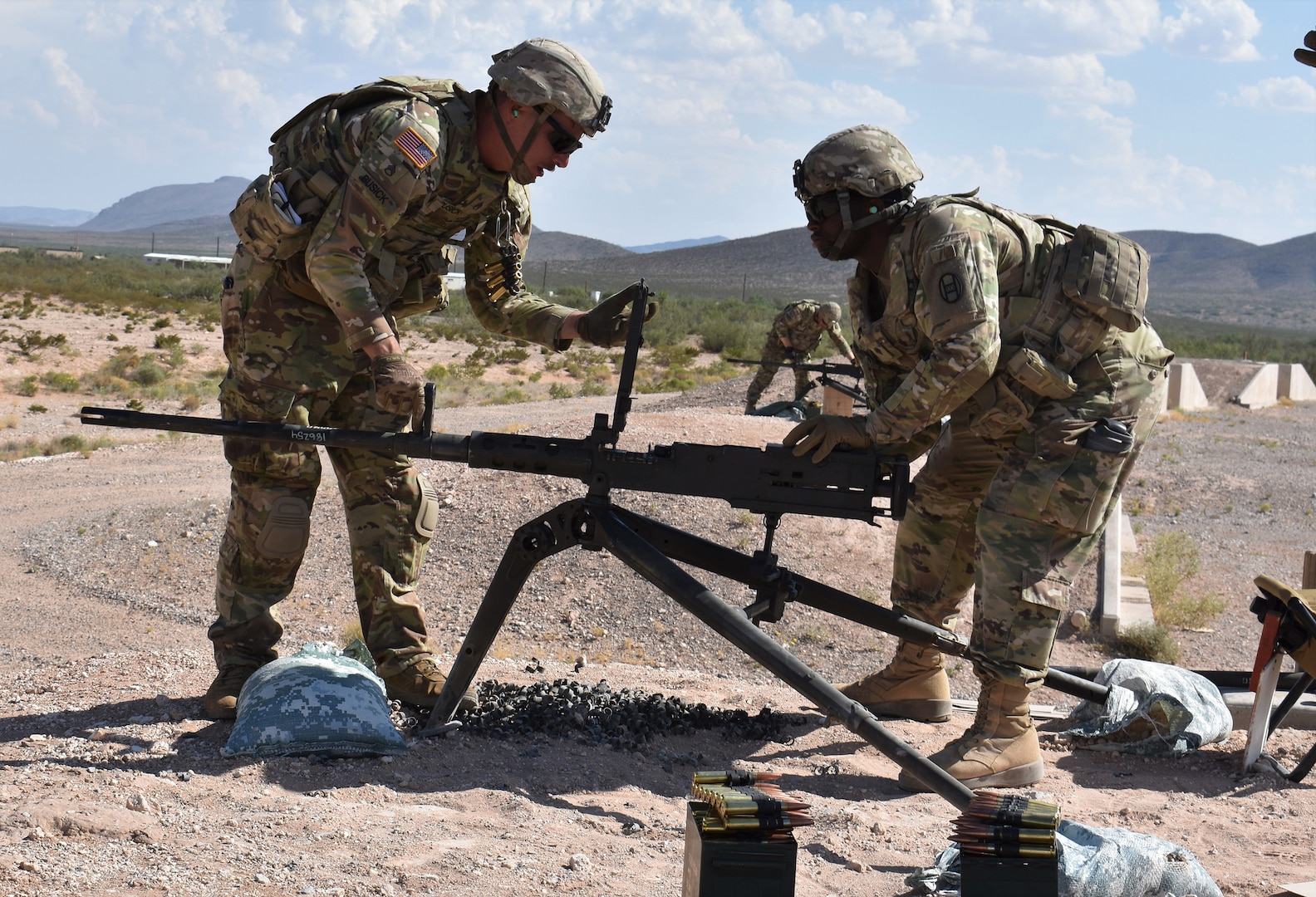 U.S. Soldiers in Echo Company, 236th Brigade Engineer Battalion, 30th Armored Brigade Combat Team, North Carolina National Guard, fire the M2 .50 caliber machine gun in the vicinity of Fort Bliss, Texas, August 27, 2019.