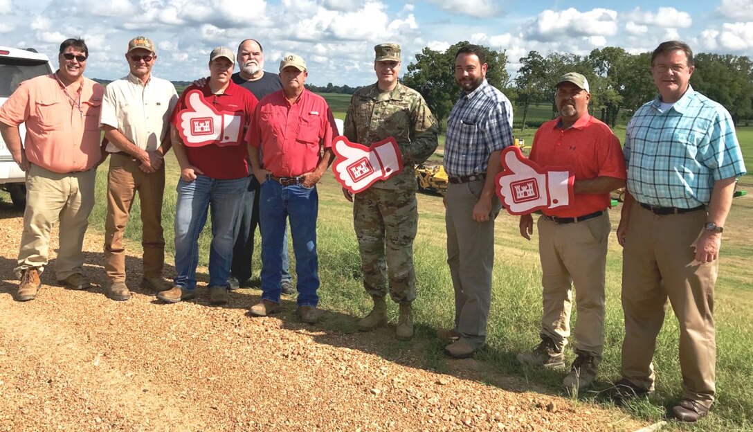 IN THE PHOTO, are Memphis District Commander Zachary Miller (fourth from right), Bruce Cook (third from right) with the Yazoo-Mississippi Delta Levee Board, along with the VuConn, LLC subcontractor Donny Bond of Donald Bond Construction and members of the Memphis District team.